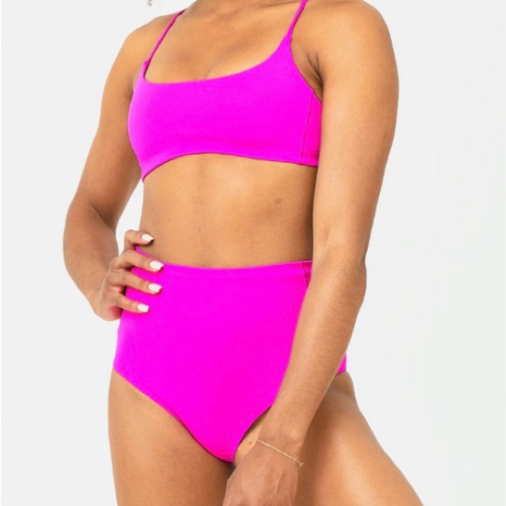 Left on Friday high tide swim bottoms size medium new with tags and liner